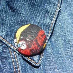 Wolverine lapel pin.